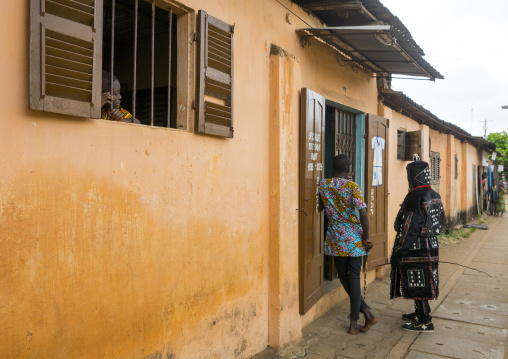Benin, West Africa, Porto-Novo, egoun egoun spirit of the deads walking in the street with his guide to ask money to people