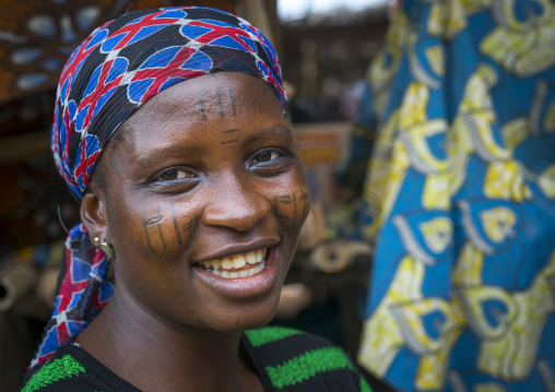 Benin, West Africa, Onigbolo Isaba, holi tribe woman covered with traditional facial tattoos and scars