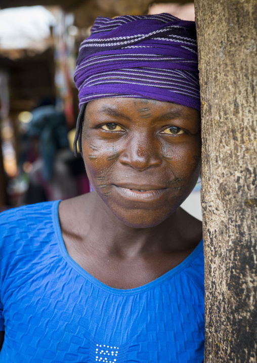 Benin, West Africa, Onigbolo Isaba, holi tribe woman covered with traditional facial tattoos and scars