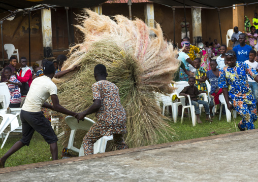 Benin, West Africa, Porto-Novo, zangbeto guardian of the night spirit dance in the royal palace