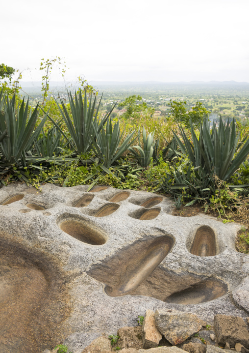 Benin, West Africa, Dassa-Zoumè, holes in the rock to crush yam