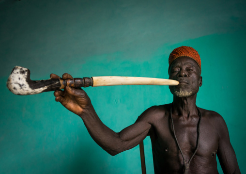 Benin, West Africa, Taneka-Koko, traditional healer called mister tcholi with his giant pipe