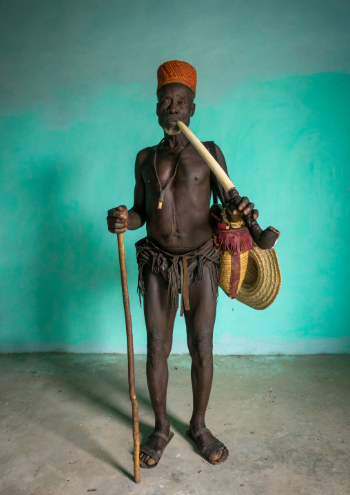 Benin, West Africa, Taneka-Koko, traditional healer called mister tcholi with his giant pipe
