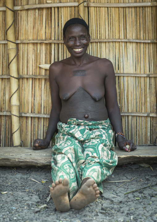 Benin, West Africa, Onigbolo Isaba, holi tribe woman covered with traditional tattoos and scars