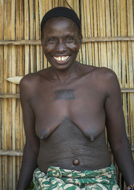 Benin, West Africa, Onigbolo Isaba, holi tribe woman covered with traditional tattoos and scars