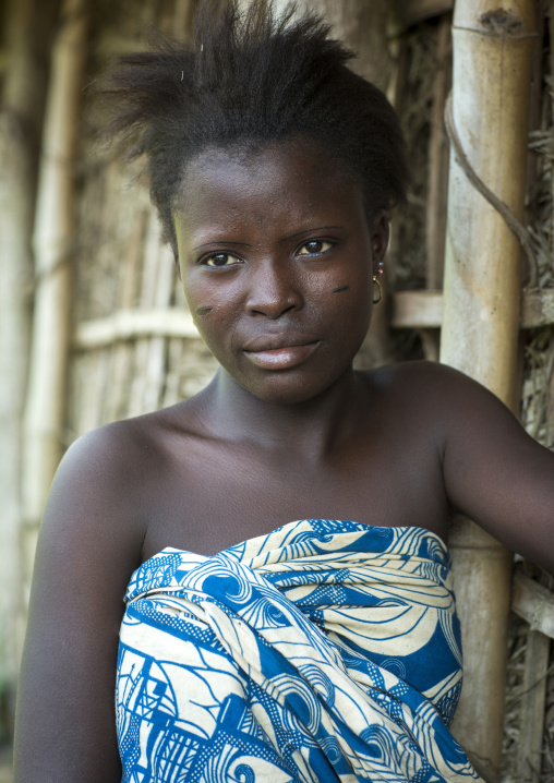 Benin, West Africa, Onigbolo Isaba, holi tribe girl with traditional facial tattoos and scars