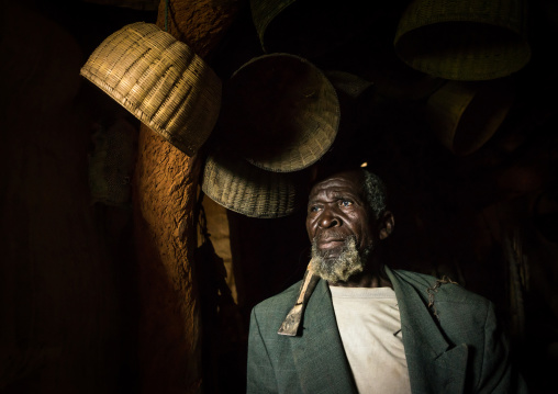 Benin, West Africa, Boukoumbé, mr kouagou maxon in his tata somba house and his traditional medicine