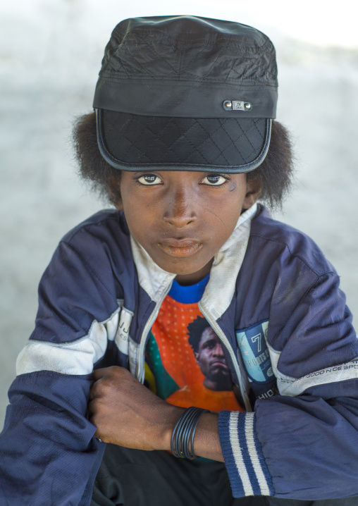 Benin, West Africa, Gossoue, fulani peul tribe boy with fashionable clothes