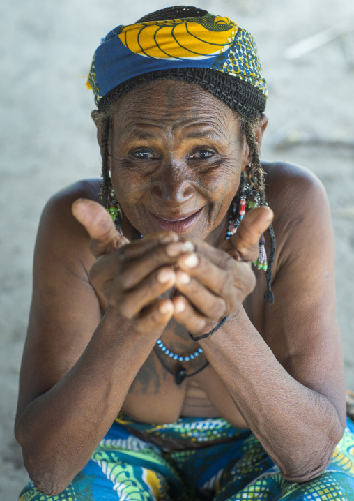 Benin, West Africa, Gossoue, an old tattooed fulani peul tribe woman portrait