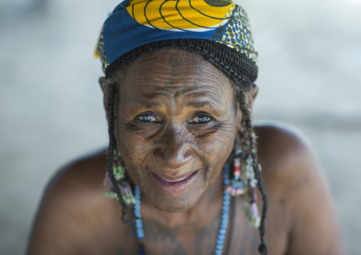 Benin, West Africa, Gossoue, an old tattooed fulani peul tribe woman portrait