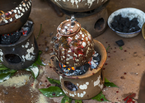 Benin, West Africa, Bonhicon, chicken cooked in a pot during a voodoo ceremony