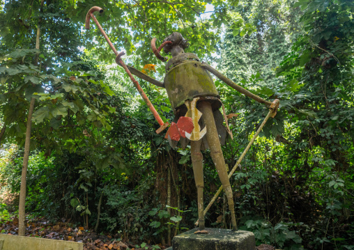 Benin, West Africa, Ouidah, voodoo statue in the sacred forest of kpasse