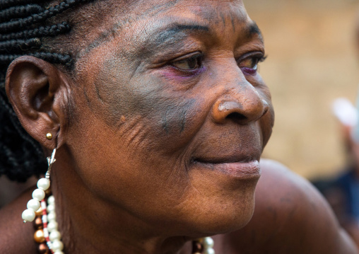 Benin, West Africa, Bopa, voodoo priestess with tattooed face during a ceremony