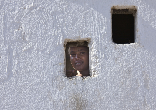 Woman Looking Thru A Little Window, Obock, Djibouti
