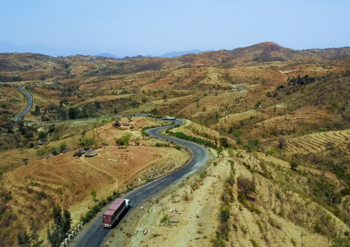 Aerial view of a truck passing in the Konso hills and terraces, Omo Valley, Konso, Ethiopia
