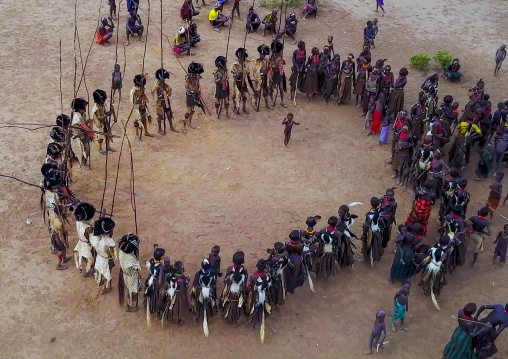 Aerial view of dimi ceremony in the Dassanech tribe to celebrate circumcision of teenagers, Omo Valley, Omorate, Ethiopia