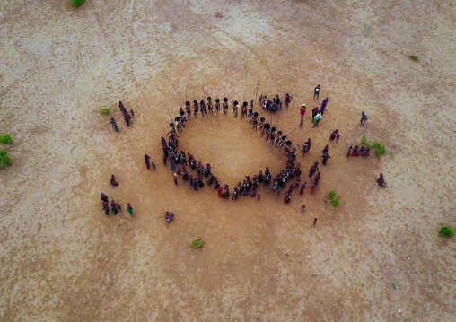 Aerial view of dimi ceremony in the Dassanech tribe to celebrate circumcision of teenagers, Omo Valley, Omorate, Ethiopia