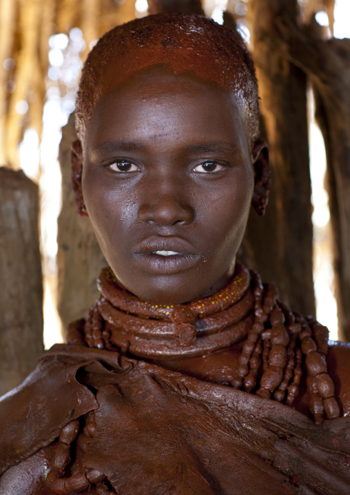 Utah Woman From The Hamer Tribe Posing In Her Hut, Omo Valley, Ethiopia