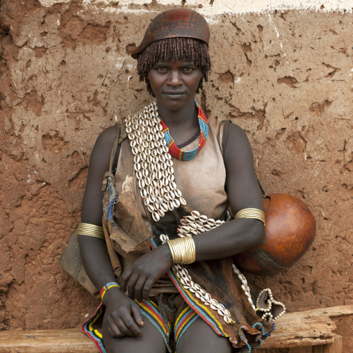 Bana Tribe Woman With Shell Belt And Calabash In Key Afer, Omo Valley, Ethiopia