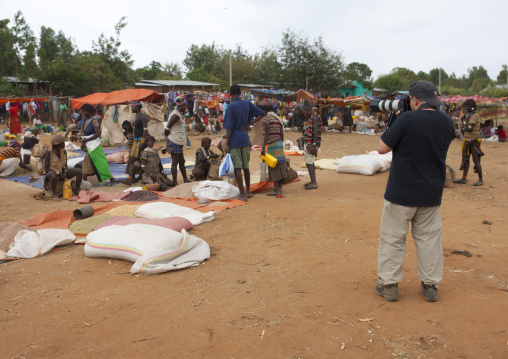 Tourist Taking A Picture Of People On Key Afer Market Omo Valley Ethiopia
