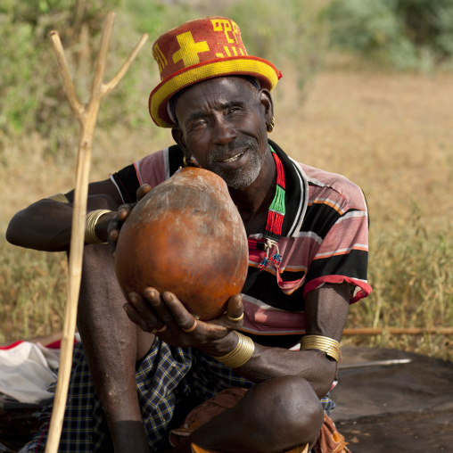Senior Banna Man With Original Hat On And Calabash In The Hand Ethiopia