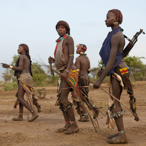 Bana Women Carrying Kalashnikov And Whips Bull Jumping Ceremony Ethiopia
