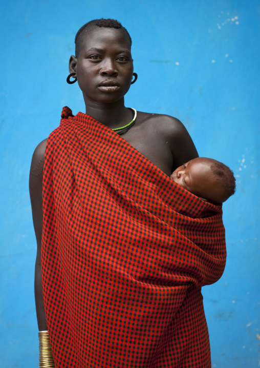 Bodi Mother Carrying Her Sleeping Child In Red Canvas Loincloth Hana Mursi Village Omo Valley Ethiopia