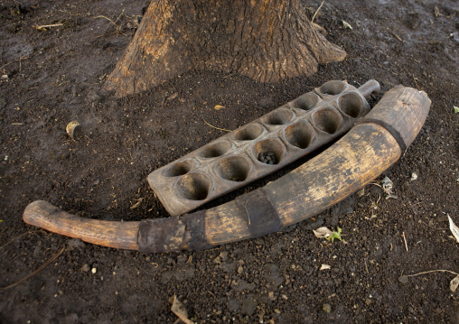 Oware Game On The Floor Next To Elephant Tusk Bodi Kael New Year Ceremony Omo Valley Ethiopia