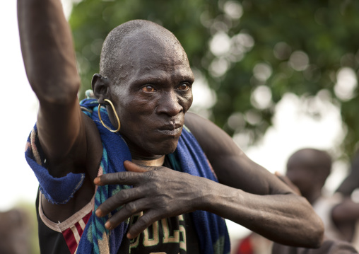 Senior Bodi Concentrated Man Raising An Arm During Kael New Year Ceremony Ethiopia