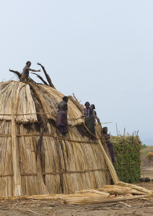 Arbore Tribe Women Making A Thatch Hut, Omo Valley, Ethiopia