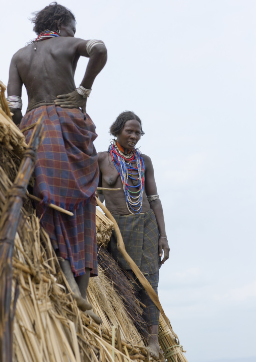 Arbore Tribe Women Making A Thatch Hut, Omo Valley, Ethiopia