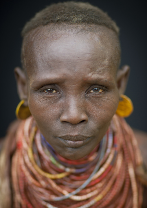 Portrait Of A Karo Woman With Beaded Necklaces And Earrings Ethiopia