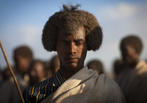 Portrait Of A Tired Karrayyu Tribe Man With His Gunfura Traditional Hairstyle Covered Of Dust During Gadaaa Ceremony, Metehara, Ethiopia