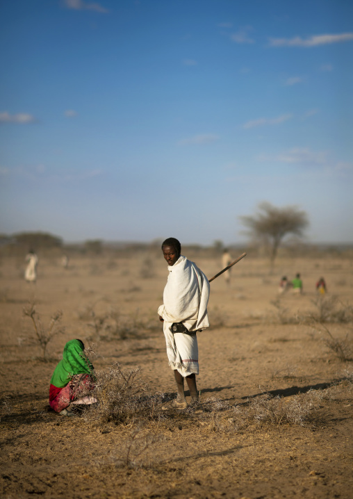 Karrayyu Tribe Couple In A Field During Gadaaa Ceremony, Metahara, Ethiopia