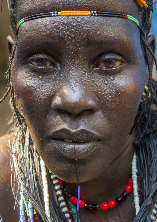 Woman From Anuak Tribe In Traditional Clothing, Gambela, Ethiopia