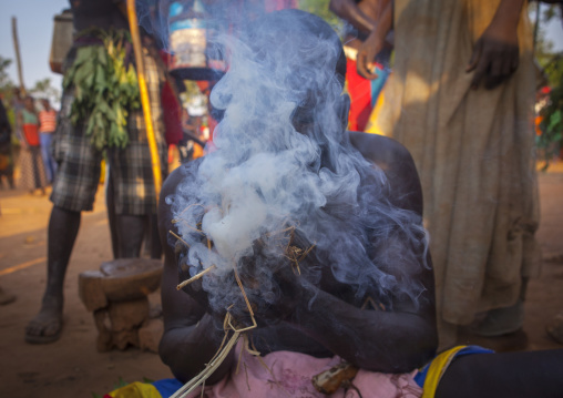 Majang Tribe Man Smoking For A Celebration, Kobown, Ethiopia