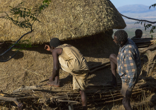Konso Tribe Men Building A Mora, The Common House, Konso Village, Omo Valley, Ethiopia