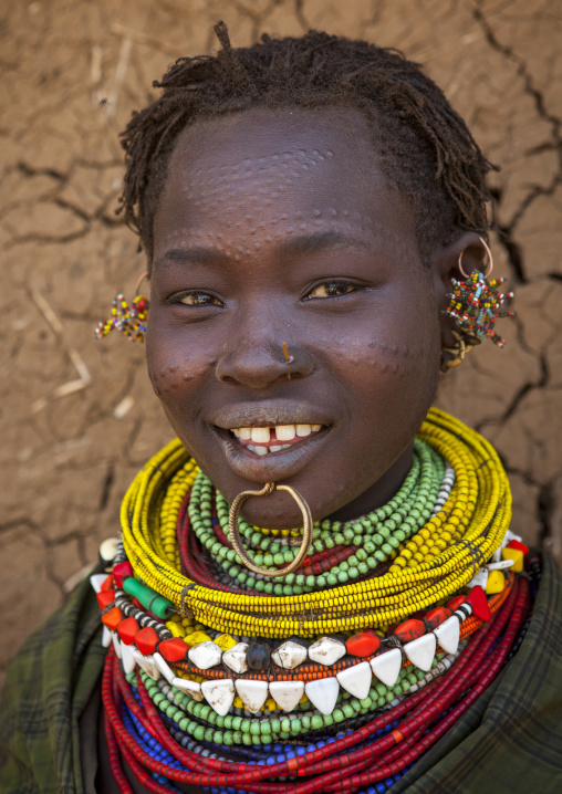Portrait Of A Topossa Woman, With Traditional Clothes, Omo Valley, Kangate, Ethiopia