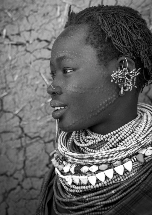 Portrait Of A Topossa Woman, With Traditional Clothes, Omo Valley, Kangate, Ethiopia