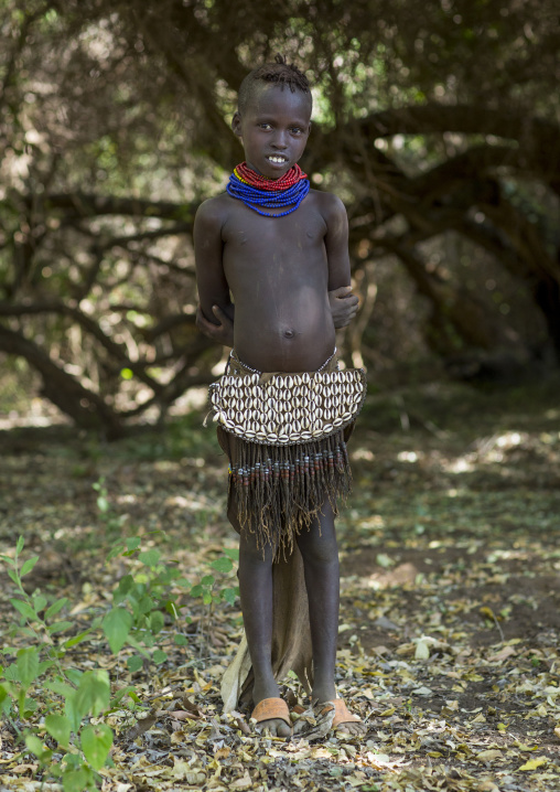 Portrait Of A Nyangatom Tribe Girl With A Traditional Skirt, Omo Valley, Kangate, Ethiopia