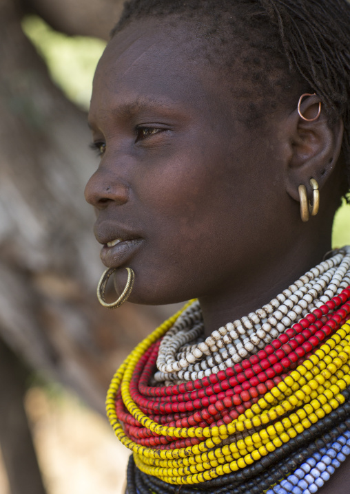 Portrait Of A Topossa Woman, With Traditional Clothes, Omo Valley, Kangate, Ethiopia