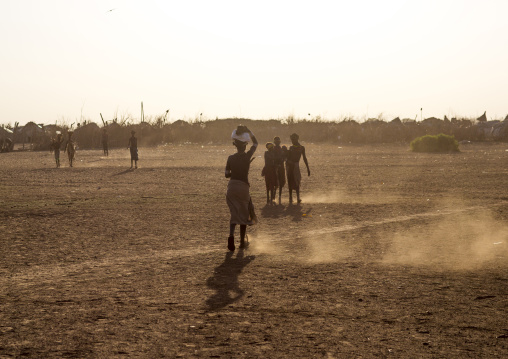 Dassanech Tribe People Going Back To Their Village At Sunset, Omorate, Omo Valley, Ethiopia