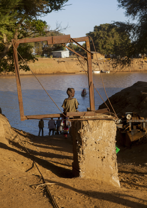 Dassanech Tribe Kid In Front Of Omo River, Omorate, Ethiopia