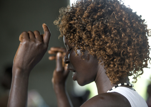 Woman Praying During Catholic Sunday Church Service, Gambela, Ethiopia