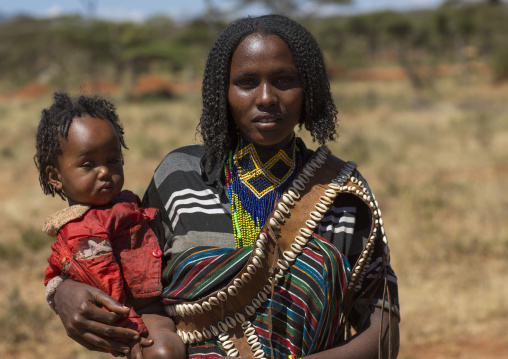 Borana Tribe Mother Carrying Her Baby, Yabelo, Ethiopia