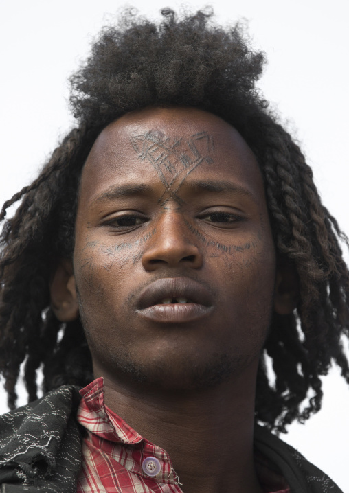 Afar Tribe Man With Curly Hair And Facial Tattoos, Assayta, Ethiopia