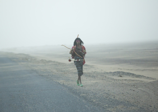 Afar Tribe Man Alone Along A Road, Assayta, Ethiopia