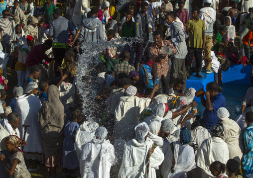 Holy Water Sprayed Onto The Crowd Attending Timkat Celebrations Of Epiphany, Lalibela, Ethiopia