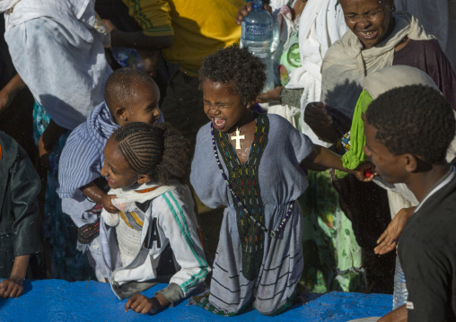Holy Water Sprayed Onto The Crowd Attending Timkat Celebrations Of Epiphany, Lalibela, Ethiopia