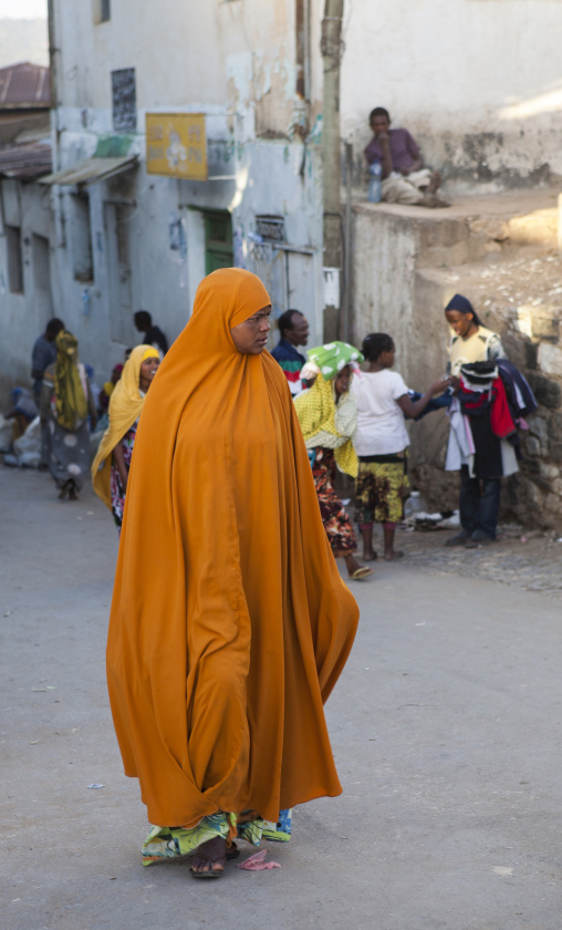 Woman Walking In The Narrow Streets Of The Old Town, Harar, Ethiopia